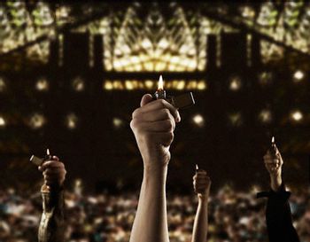 https://mediaproxy.tvtropes.org/width/350/https://static.tvtropes.org/pmwiki/pub/images/lighter_at_concert.jpg